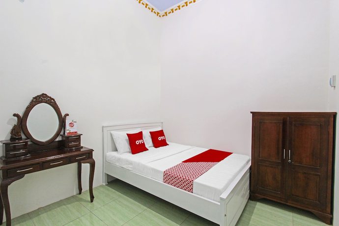 Imagen de la habitación del Hotel OYO 91817 Grand New Si Jago. Foto 7