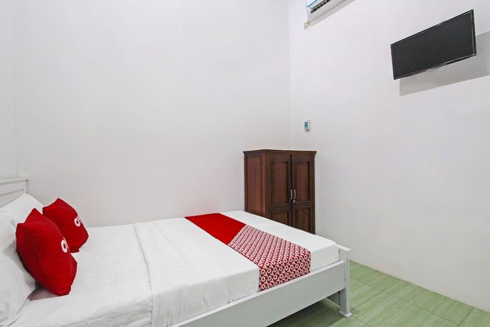 Imagen de la habitación del Hotel OYO 91817 Grand New Si Jago. Foto 8