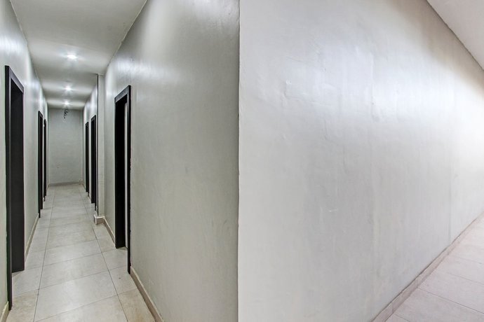 Imagen de los interiores del Hotel OYO 91819 Larich Guest House. Foto 10