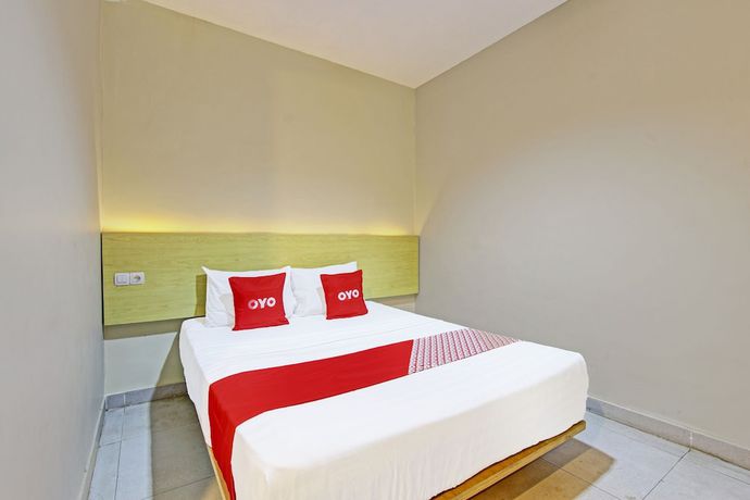 Imagen de la habitación del Hotel OYO 91819 Larich Guest House. Foto 5