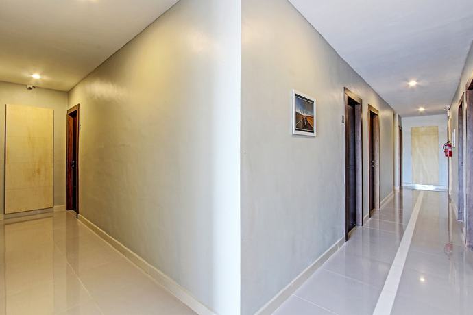 Imagen de los interiores del Hotel OYO 91819 Larich Guest House. Foto 12