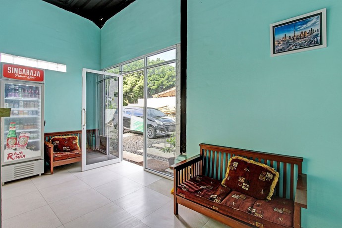 Imagen de los interiores del Hotel OYO 91819 Larich Guest House. Foto 13