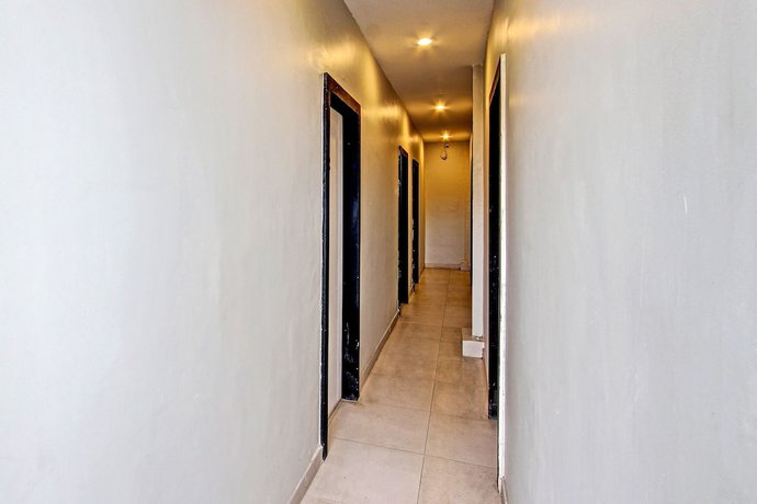 Imagen de los interiores del Hotel OYO 91819 Larich Guest House. Foto 14