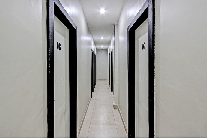 Imagen de los interiores del Hotel OYO 91819 Larich Guest House. Foto 17