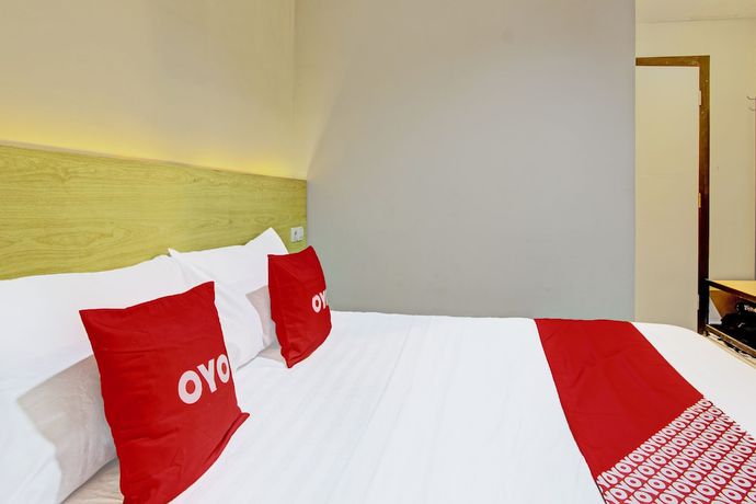 Imagen de la habitación del Hotel OYO 91819 Larich Guest House. Foto 6