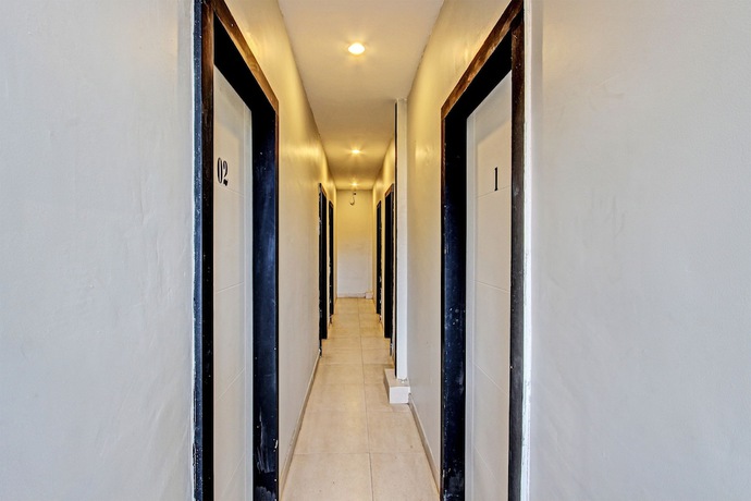 Imagen de los interiores del Hotel OYO 91819 Larich Guest House. Foto 18