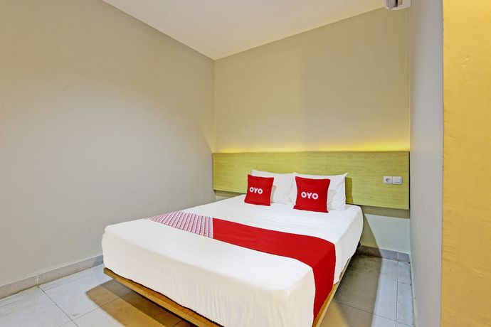 Imagen de la habitación del Hotel OYO 91819 Larich Guest House. Foto 8