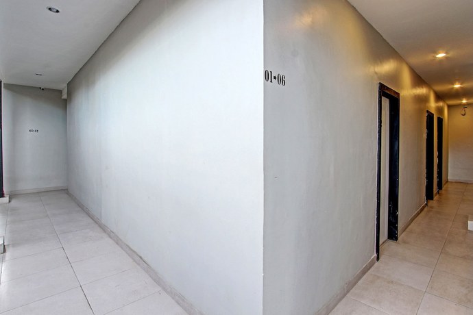 Imagen de los interiores del Hotel OYO 91819 Larich Guest House. Foto 20