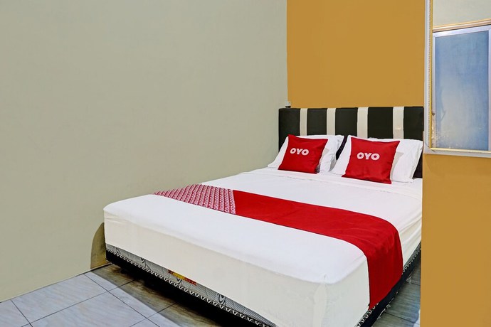 Imagen de la habitación del Hotel OYO 91825 Ayu Lestari Homestay. Foto 8