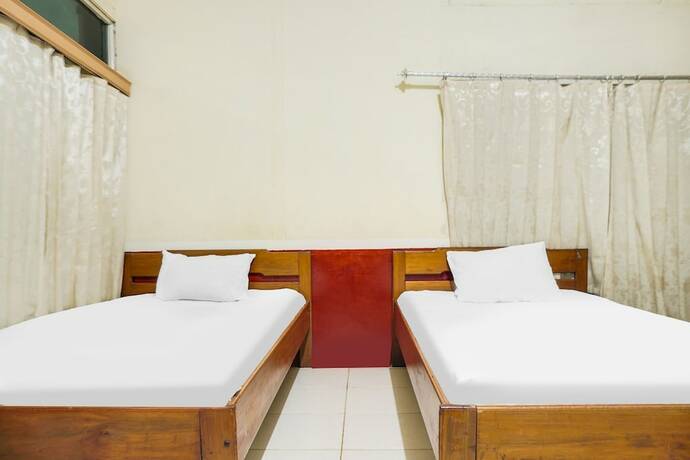 Imagen de la habitación del Hotel OYO 91833 Anggrek Daqu Syariah Kapuas. Foto 13