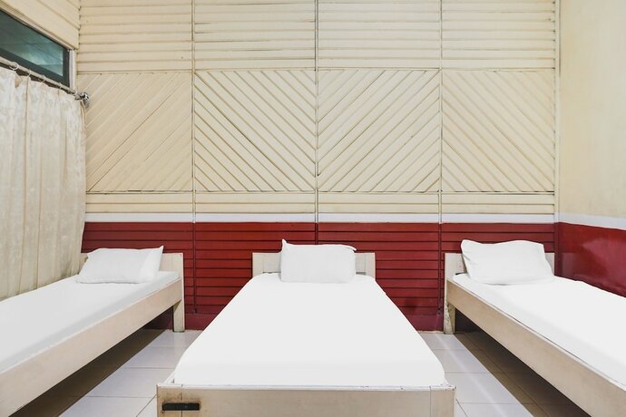 Imagen de la habitación del Hotel OYO 91833 Anggrek Daqu Syariah Kapuas. Foto 17