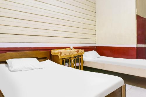 Imagen de la habitación del Hotel OYO 91833 Anggrek Daqu Syariah Kapuas. Foto 19