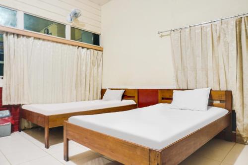 Imagen de la habitación del Hotel OYO 91833 Anggrek Daqu Syariah Kapuas, Kuala Kapuas. Foto 18