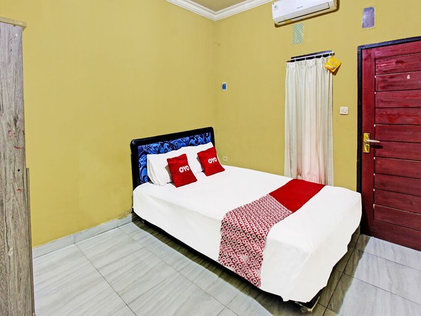 Imagen de la habitación del Hotel OYO 91845 V_ar House Near Pantai Tanjung Bias. Foto 4