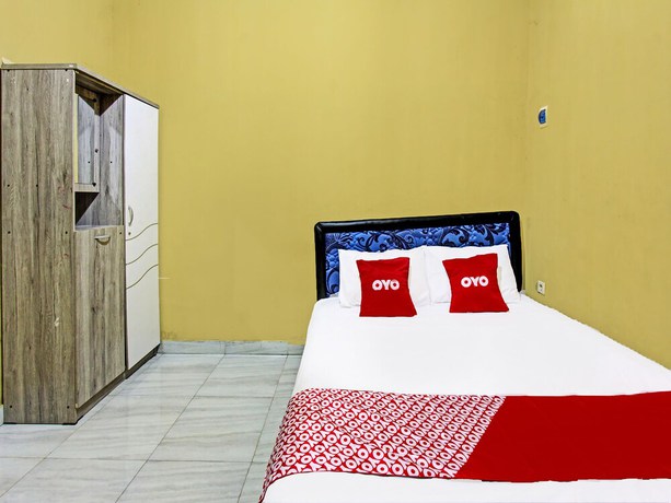 Imagen de la habitación del Hotel OYO 91845 V_ar House Near Pantai Tanjung Bias. Foto 8