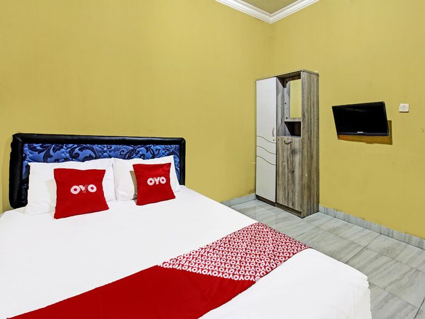 Imagen de la habitación del Hotel OYO 91845 V_ar House Near Pantai Tanjung Bias. Foto 10
