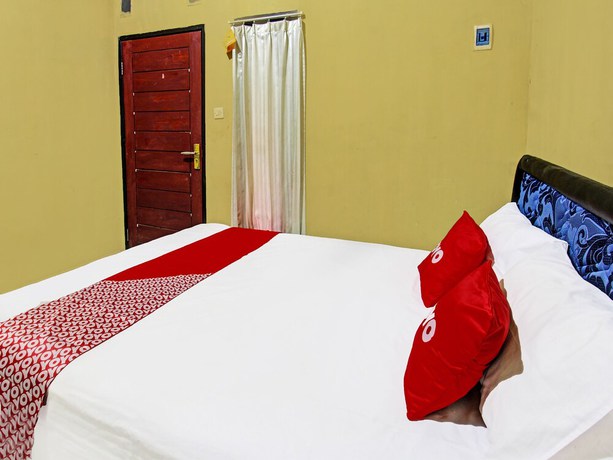 Imagen de la habitación del Hotel OYO 91845 V_ar House Near Pantai Tanjung Bias. Foto 12
