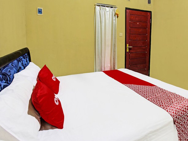 Imagen de la habitación del Hotel OYO 91845 V_ar House Near Pantai Tanjung Bias. Foto 13