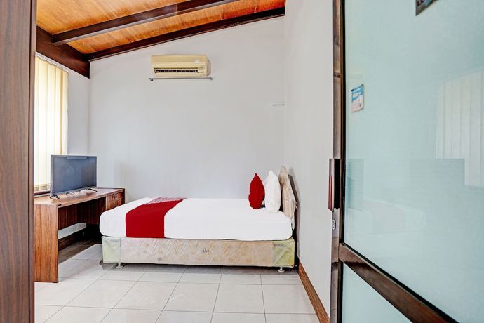 Imagen de la habitación del Hotel OYO 91846 Ms Rini Homestay Syariah. Foto 3