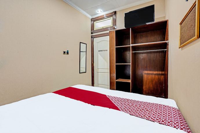 Imagen de la habitación del Hotel OYO 91846 Ms Rini Homestay Syariah. Foto 6
