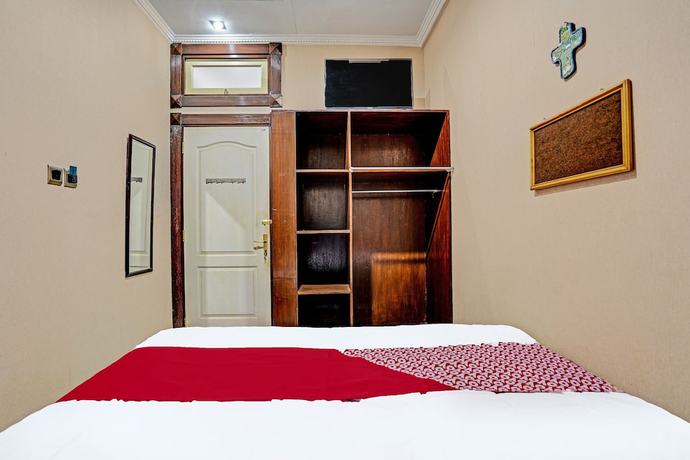 Imagen de la habitación del Hotel OYO 91846 Ms Rini Homestay Syariah. Foto 8