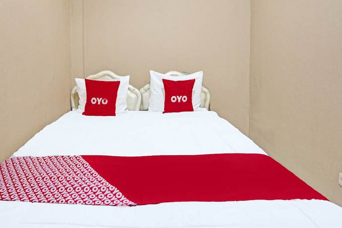 Imagen de la habitación del Hotel OYO 91846 Ms Rini Homestay Syariah. Foto 12