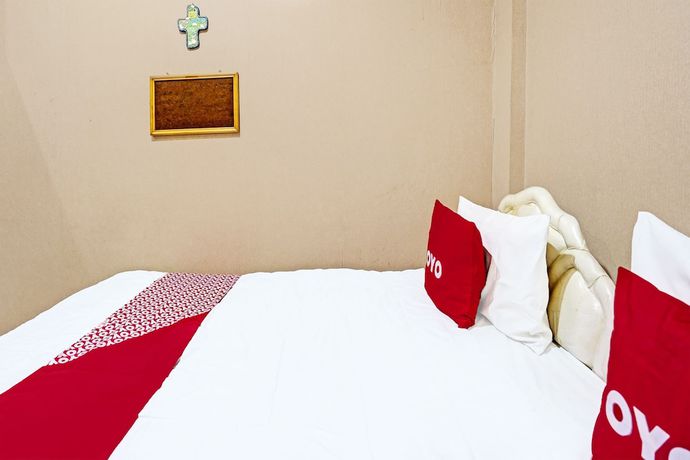Imagen de la habitación del Hotel OYO 91846 Ms Rini Homestay Syariah. Foto 13