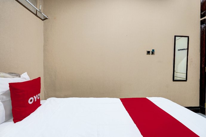 Imagen de la habitación del Hotel OYO 91846 Ms Rini Homestay Syariah. Foto 14