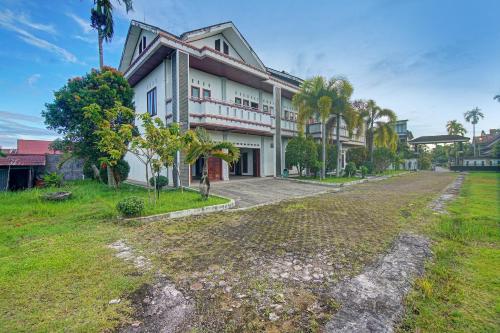 Imagen general del Hotel OYO 91852 Prima Guesthouse Syariah. Foto 9