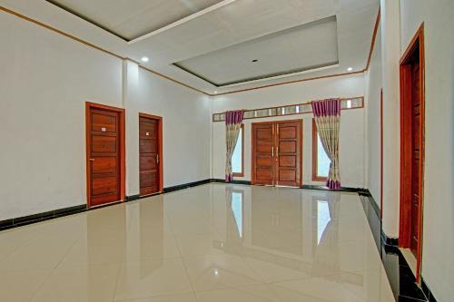 Imagen general del Hotel OYO 91852 Prima Guesthouse Syariah. Foto 12