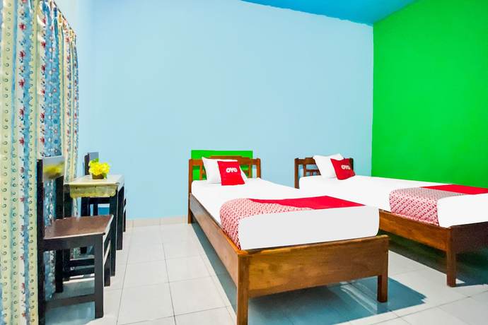 Imagen de la habitación del Hotel OYO 91861 Pemuda Kemuning Guest House. Foto 3