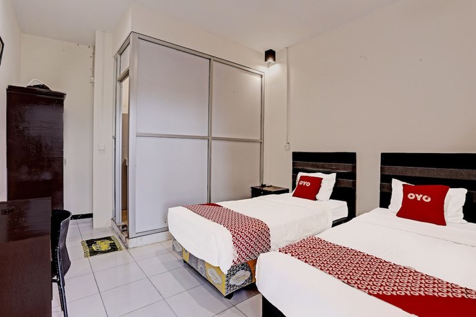Imagen de la habitación del Hotel OYO 91861 Pemuda Kemuning Guest House. Foto 6