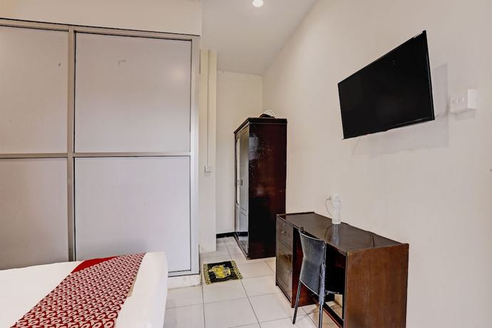 Imagen de la habitación del Hotel OYO 91861 Pemuda Kemuning Guest House. Foto 7