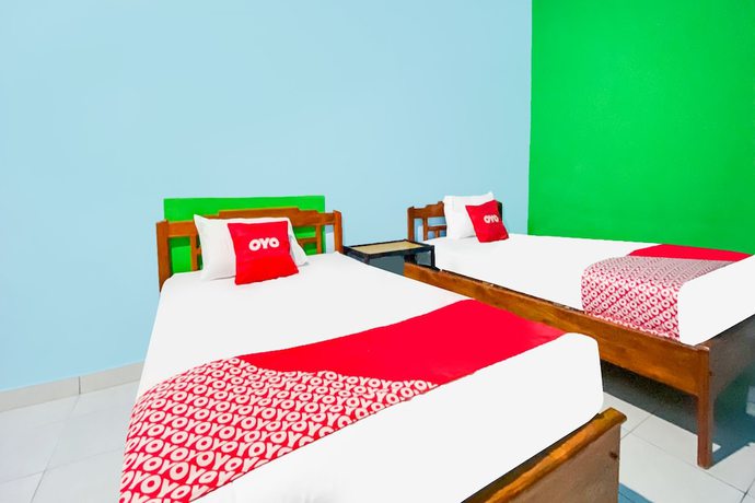 Imagen de la habitación del Hotel OYO 91861 Pemuda Kemuning Guest House. Foto 8