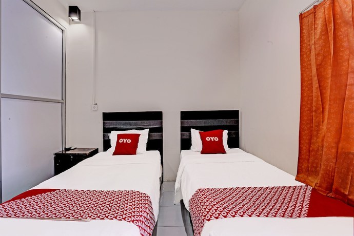 Imagen de la habitación del Hotel OYO 91861 Pemuda Kemuning Guest House. Foto 10