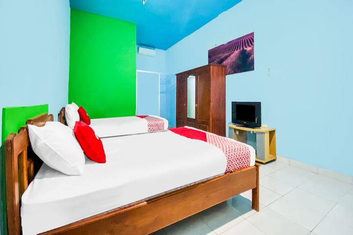 Imagen de la habitación del Hotel OYO 91861 Pemuda Kemuning Guest House. Foto 14