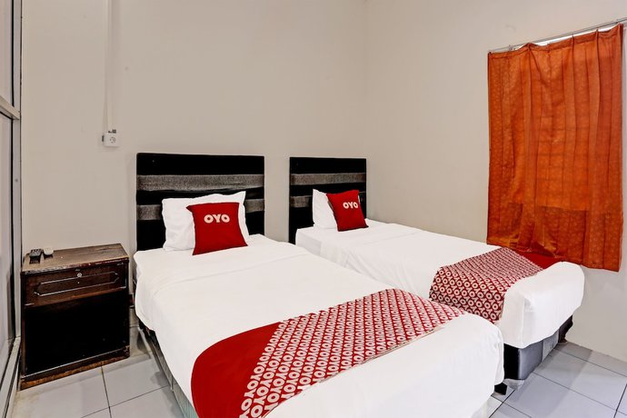 Imagen de la habitación del Hotel OYO 91861 Pemuda Kemuning Guest House. Foto 15