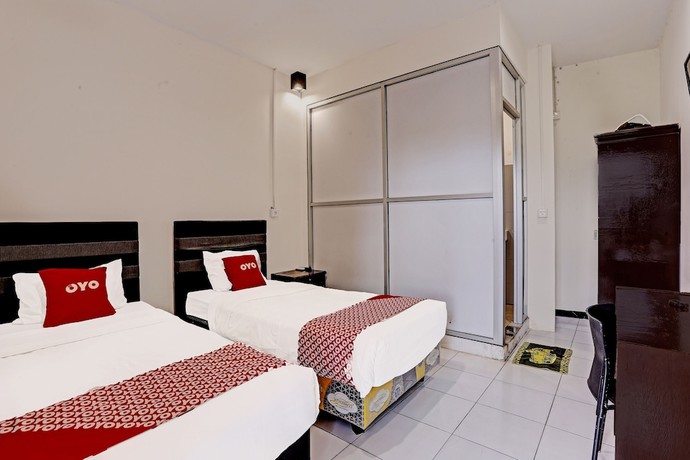 Imagen de la habitación del Hotel OYO 91861 Pemuda Kemuning Guest House. Foto 18