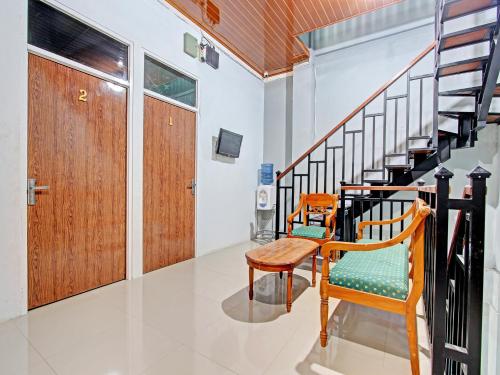 Imagen general del Hotel OYO 91960 Fariza House Syariah. Foto 12