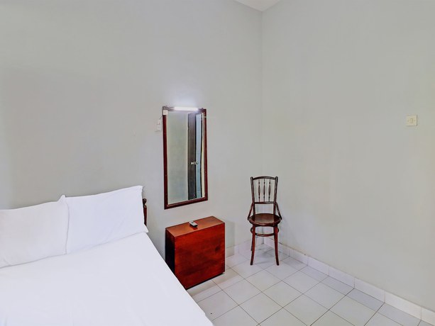 Imagen de la habitación del Hotel OYO 91971 Puri Sokasati. Foto 2