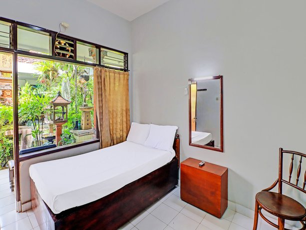 Imagen de la habitación del Hotel OYO 91971 Puri Sokasati. Foto 3