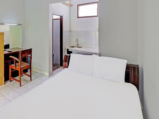 Imagen de la habitación del Hotel OYO 91971 Puri Sokasati. Foto 4