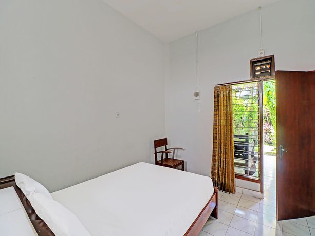 Imagen de la habitación del Hotel OYO 91971 Puri Sokasati. Foto 6