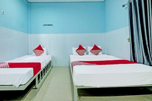 Imagen de la habitación del Hotel OYO 91987 Archery Residence Syariah. Foto 17