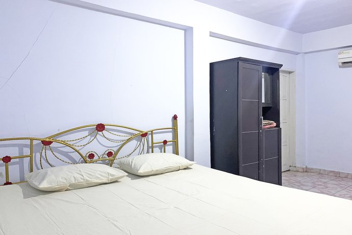 Imagen de la habitación del Hotel OYO 92002 Wisma Samudra. Foto 6