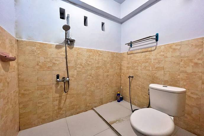 Imagen de la habitación del Hotel OYO 92002 Wisma Samudra. Foto 7