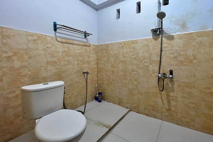 Imagen de la habitación del Hotel OYO 92002 Wisma Samudra. Foto 8