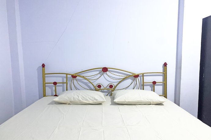 Imagen de la habitación del Hotel OYO 92002 Wisma Samudra. Foto 12