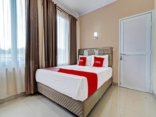 Imagen de la habitación del Hotel OYO 92023 Singgasana Cipelah Syariah. Foto 17