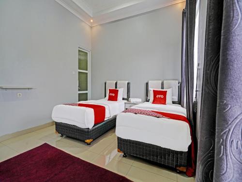 Imagen de la habitación del Hotel OYO 92023 Singgasana Cipelah Syariah. Foto 20